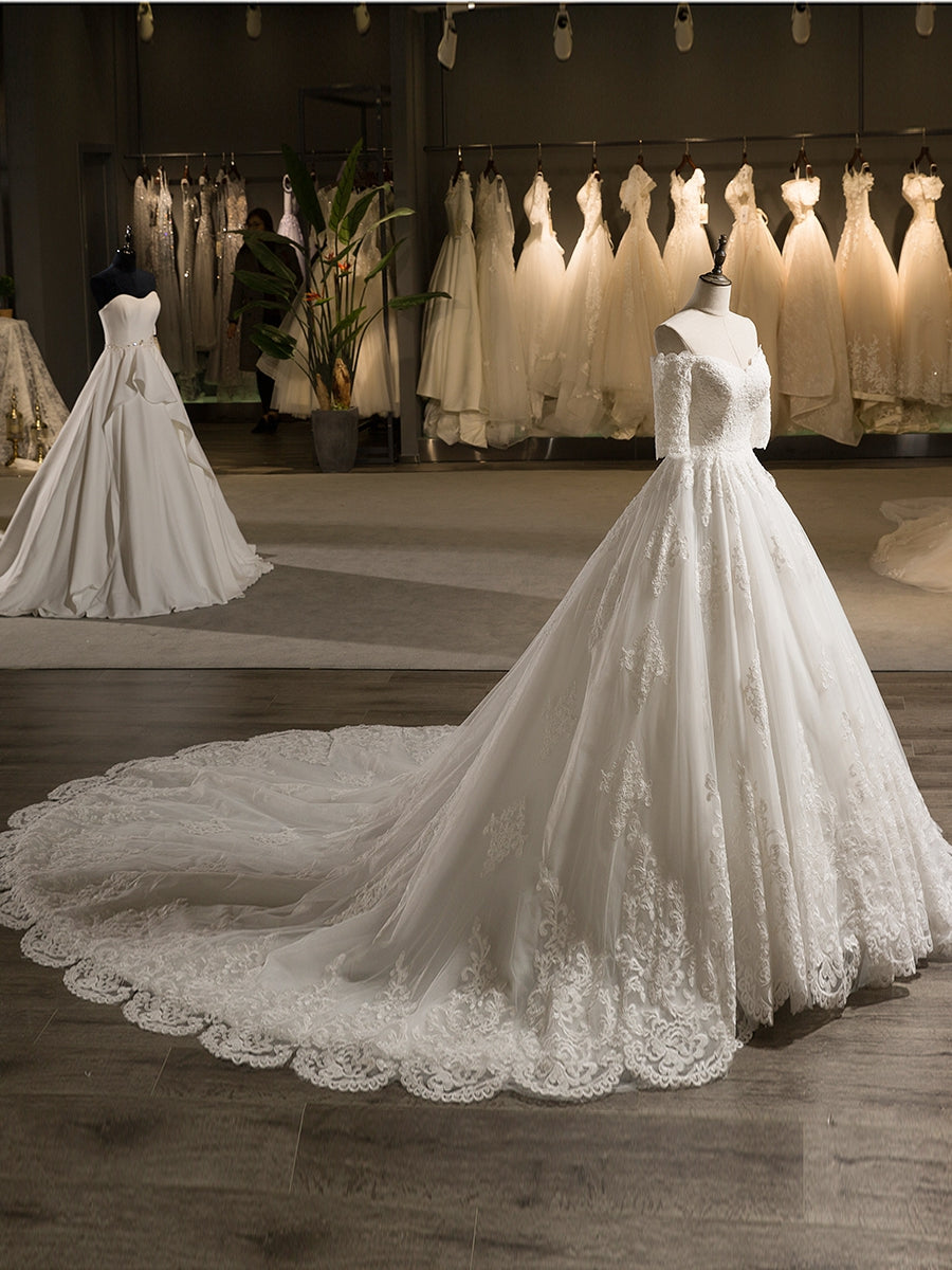 A-Line/Princess Tulle Off-the-Shoulder Half Sleeves Wedding Dresses with Lace Appliques BabaMila